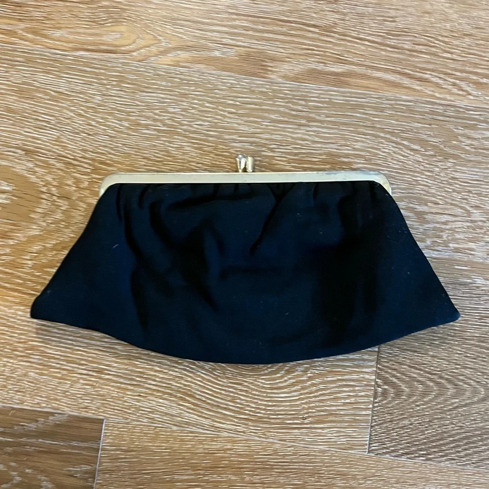 Fabric vintage clutch with a metal closure